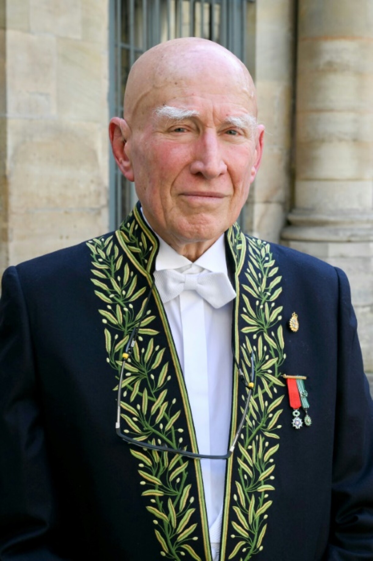 Brazilian photographer and member of the photography section of the Academy of Fine Arts (Academie des Beaux-Arts) Sebastiao Salgado poses for a photograph priro to the induction ceremony of the US photographer Annie Leibovitz (unseen) as a foreign associate member of the French Academy of Fine Arts at the Institut de France in Paris, on March 20, 2024.