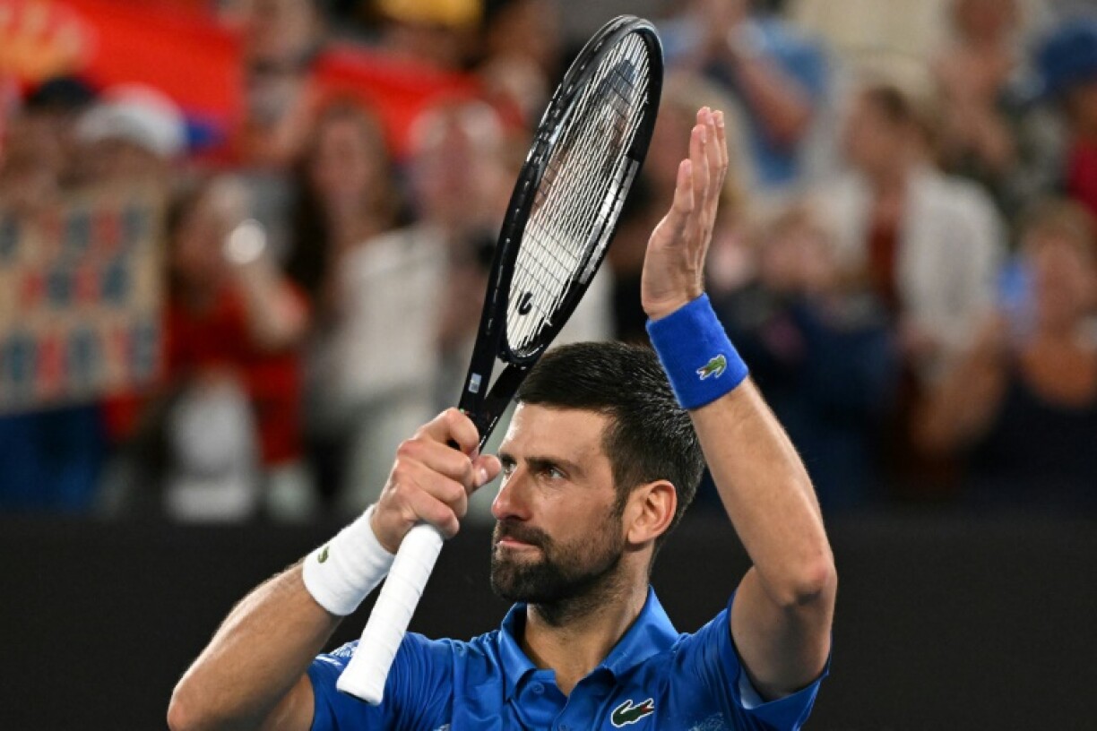 Novak Djokovic celebrates his second-round victory in his record 430th Grand Slam singles match