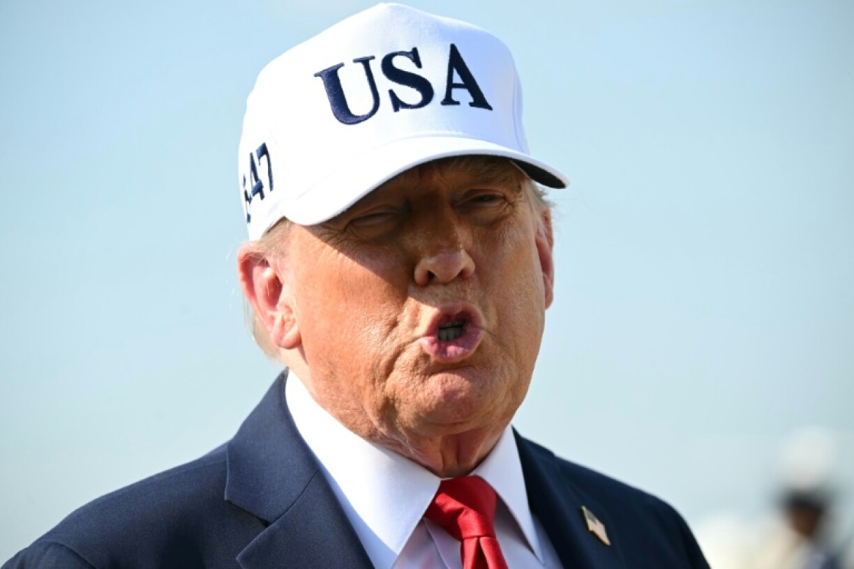 US President Donald Trump speaks to reporters at Joint Base Andrews in Maryland
