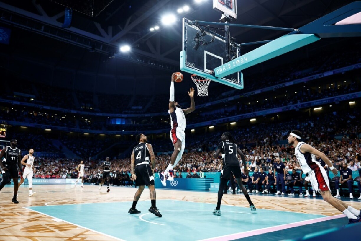 LeBron James scores for the United States in a group-stage game at the 2024 Paris Olympics, where the USA won gold