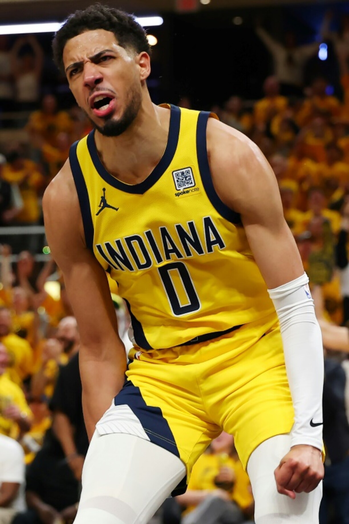 Tyrese Haliburton of Indiana celebrates a basket as the Pacers advanced to the NBA Finals, where they will face the Oklahoma City Thunder