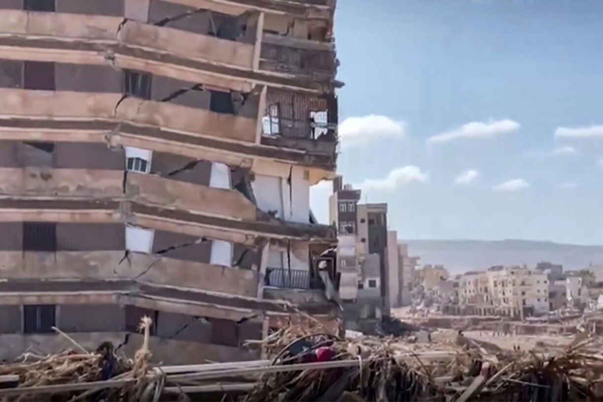 The Mediterranean city of Derna was hit by huge a wave of water after two river dams burst, sweeping away buildings, cars and the people inside them