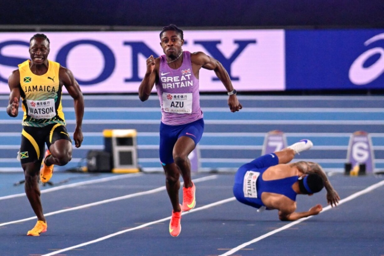 Welsh sprinter Jeremiah Azu (C) powering to the 60m world title