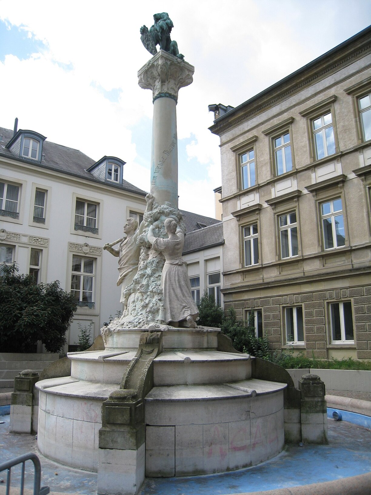 The monument to Dicks and Michel Lentz, national poets of Luxembourg, which is located at of the Place d'Armes in Luxembourg City.