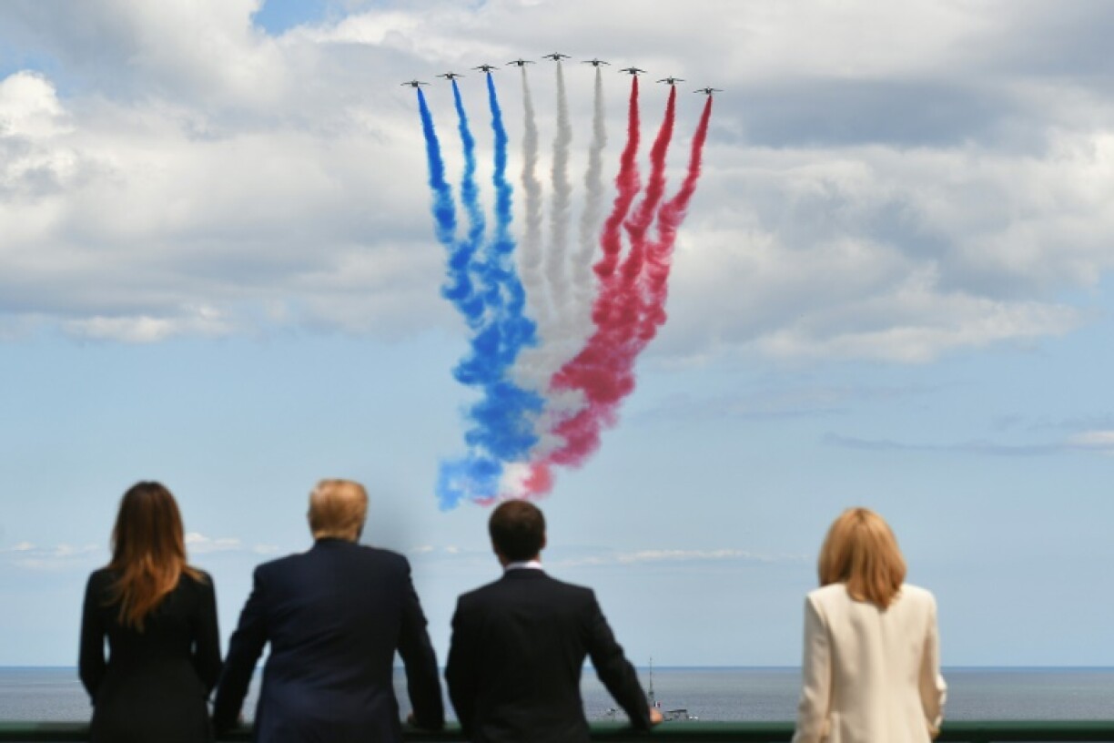 Presidents Trump and Macron attending events to mark the 75th anniversary of the D-Day landings last year.