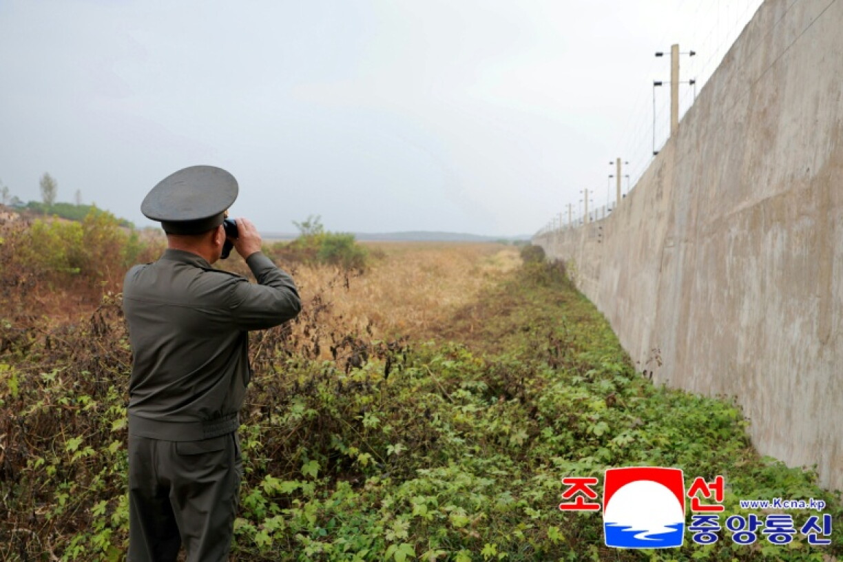 Pak Jong Chon, adviser to North Korea's Ministry of National Defence, inspects border positions as tensions heighten on the peninsula