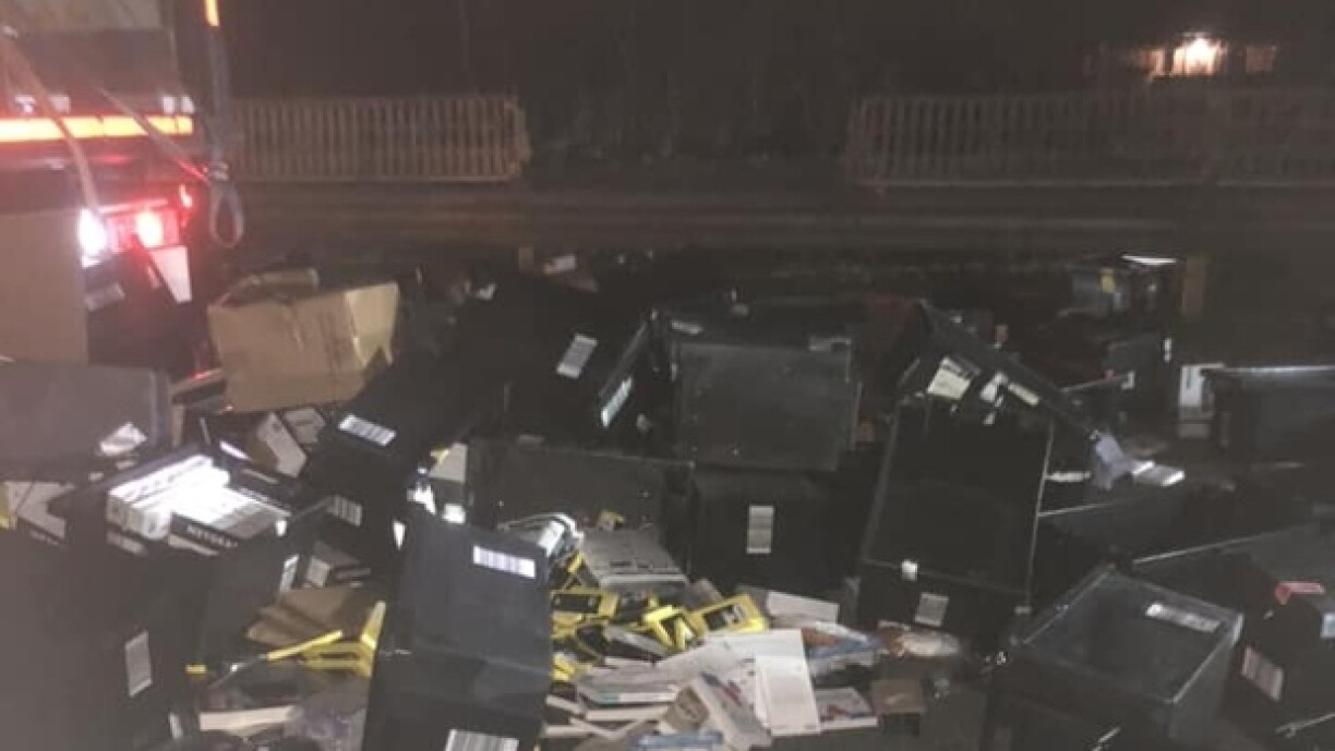 Some of the stolen parcels were in these plastic crates scattered around the floor