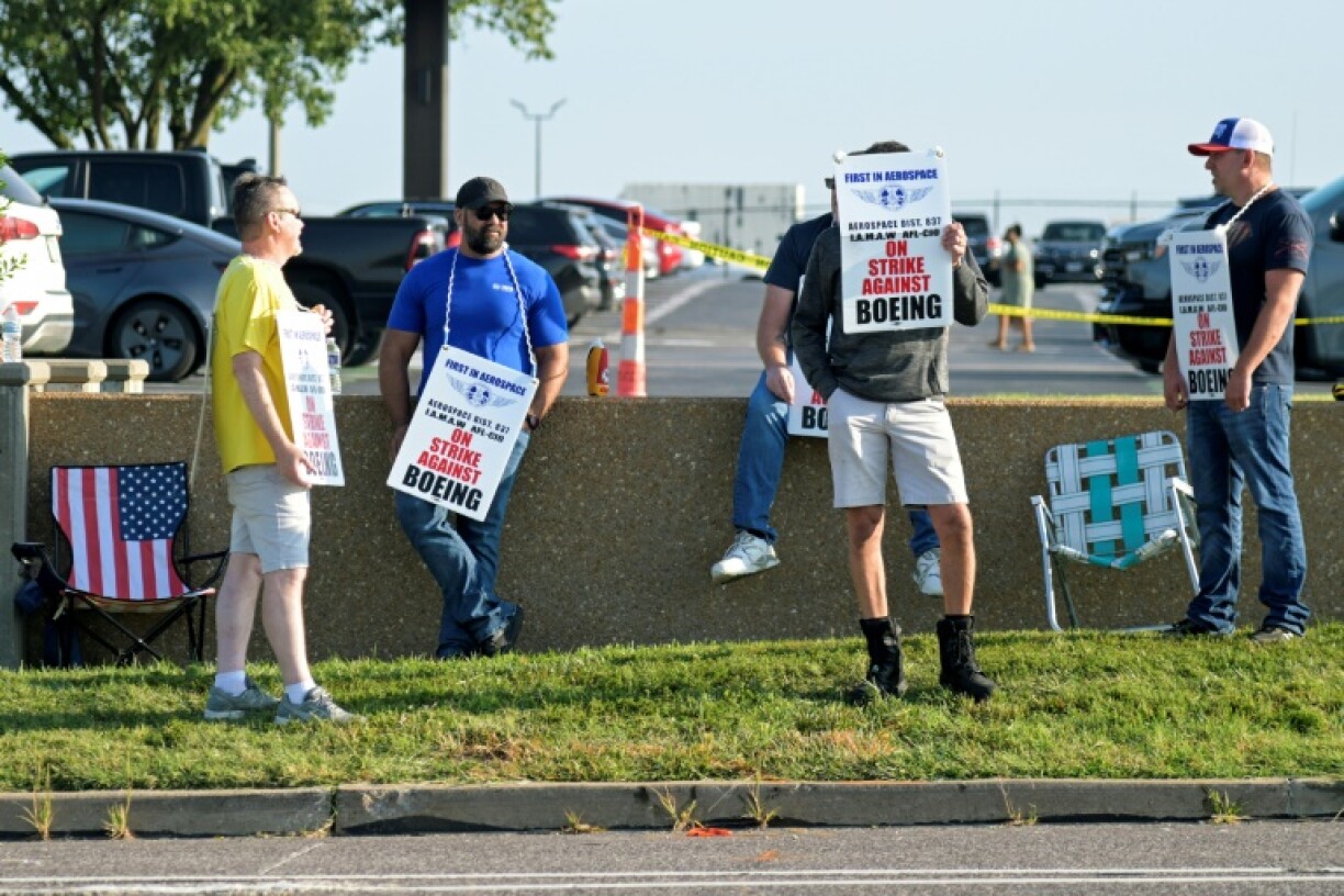 Striking Boeing defense plant workers shown outside of a Boeing facility on August 5, 2025 in Berkeley, Missouri