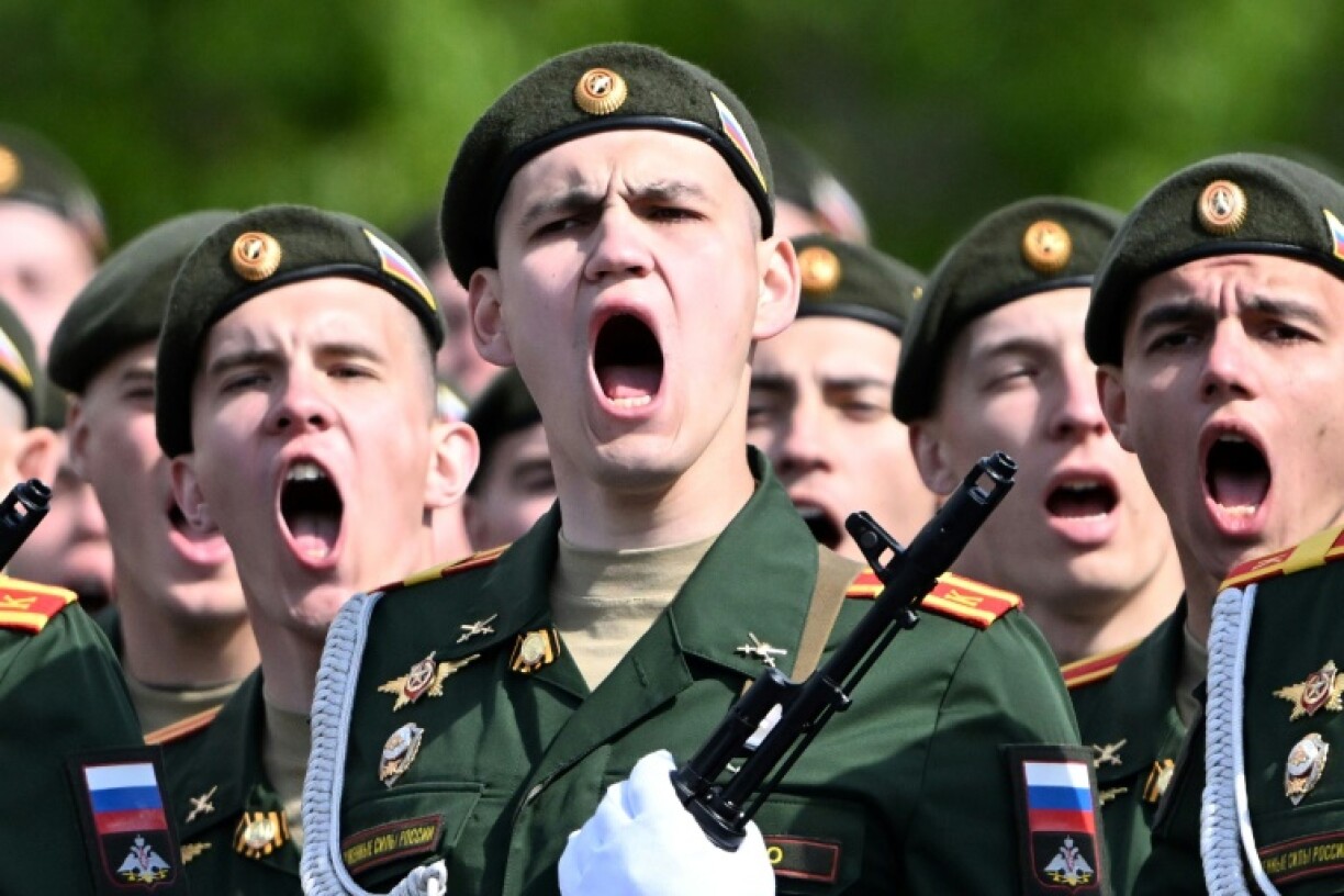 Troops shouted the traditional Russian chant of 'Ura!' and paraded in front of more than 20 foreign leaders