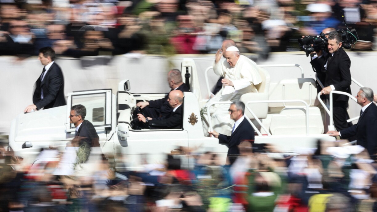Pope Francis riding in the Popemobile on St. Peter's Square after the mass on Palm Sunday in 2024.