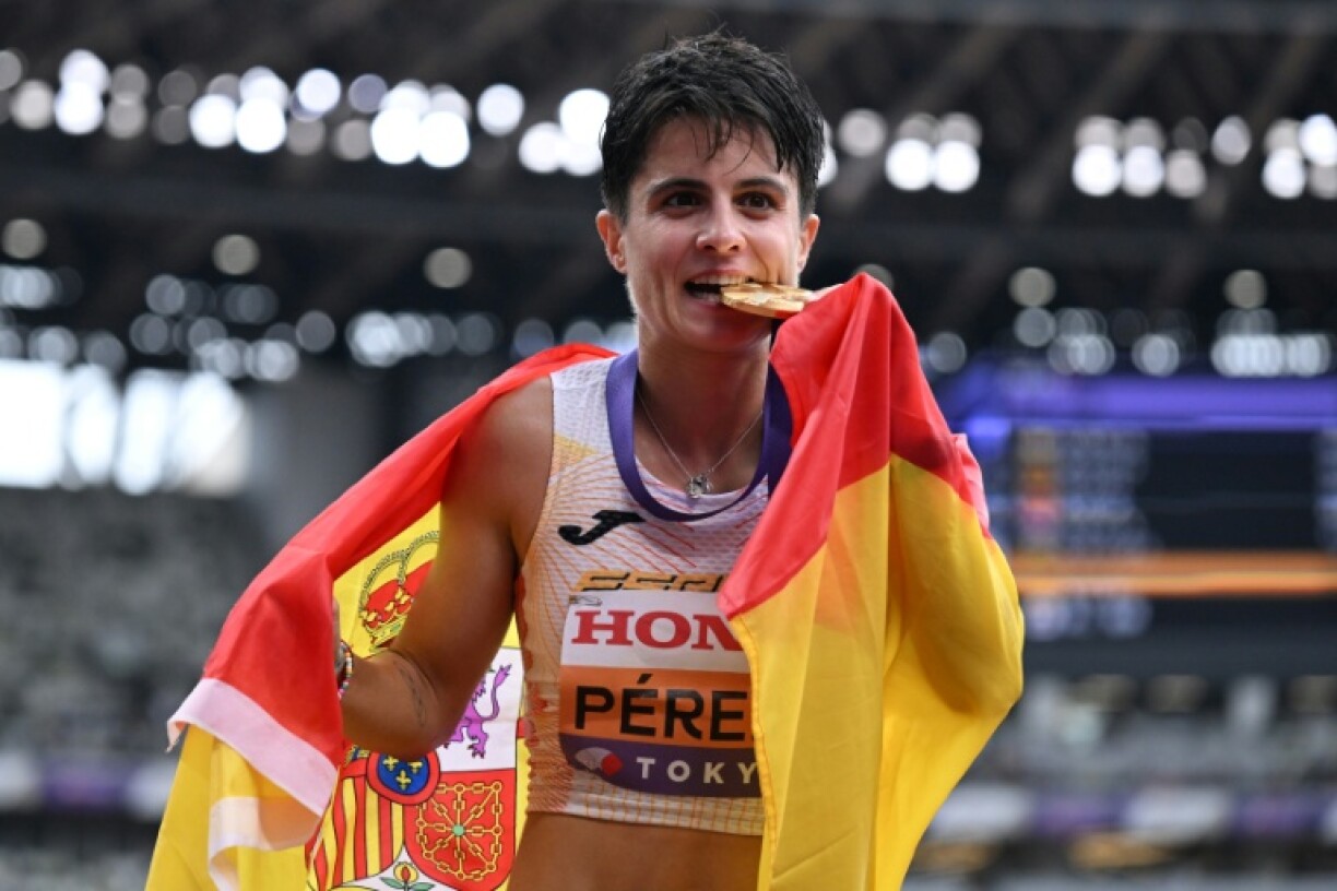 Spain's Maria Perez celebrates after winning the women's 20km race walk