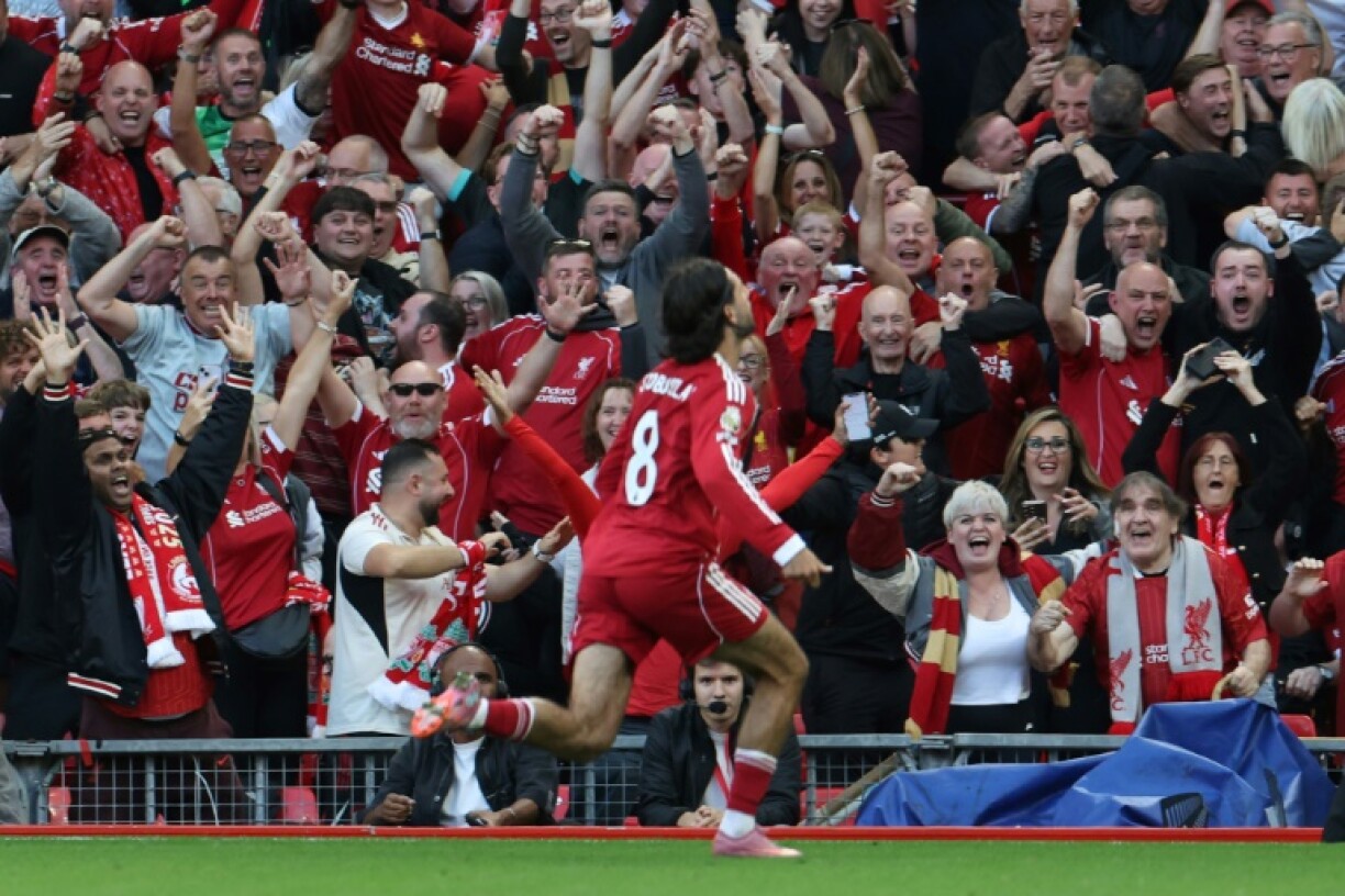 Liverpool's Dominik Szoboszlai celebrates scoring against Arsenal