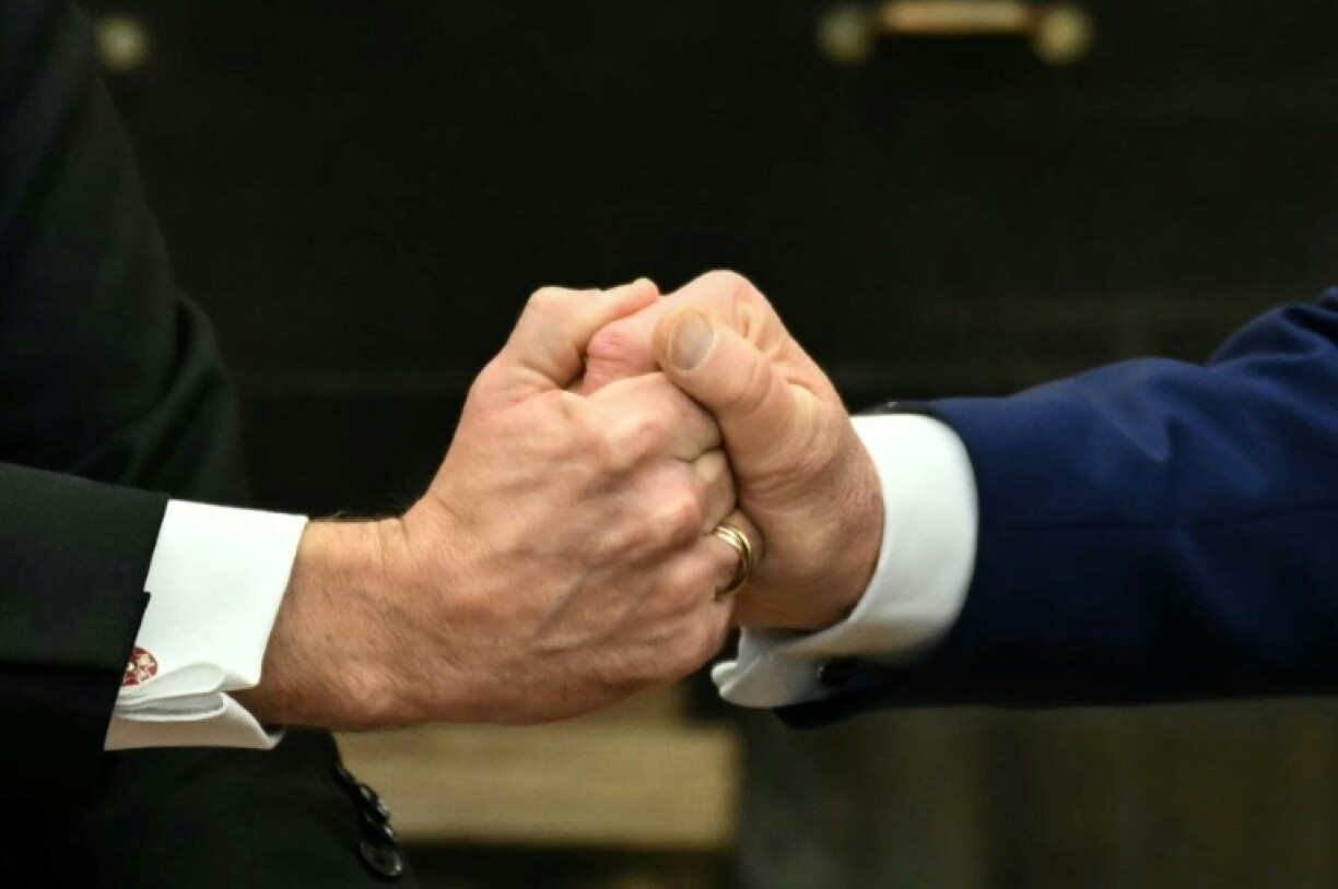 Trump and Macron gripped hands tightly during their Oval Office meeting