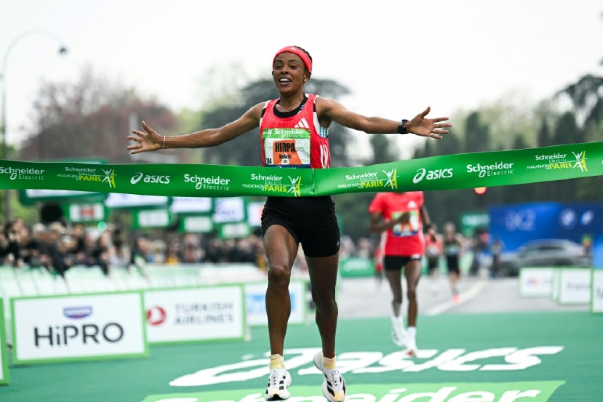 Bedatu Hirpa crosses the finish line to win the women's Paris Marathon