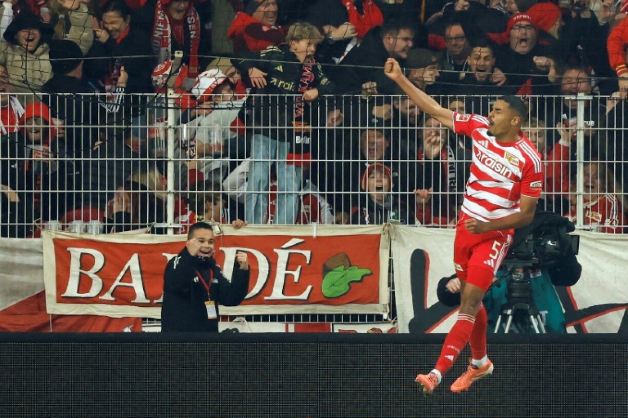 Union Berlin defender Danilho Doekhi celebrates a goal in his side's 2-2 home draw with Bayern Munich.
