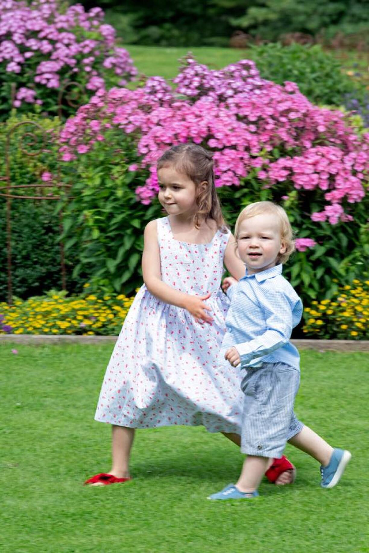 Young Princess Amalia is clearly protective of her younger brother Prince Liam.
