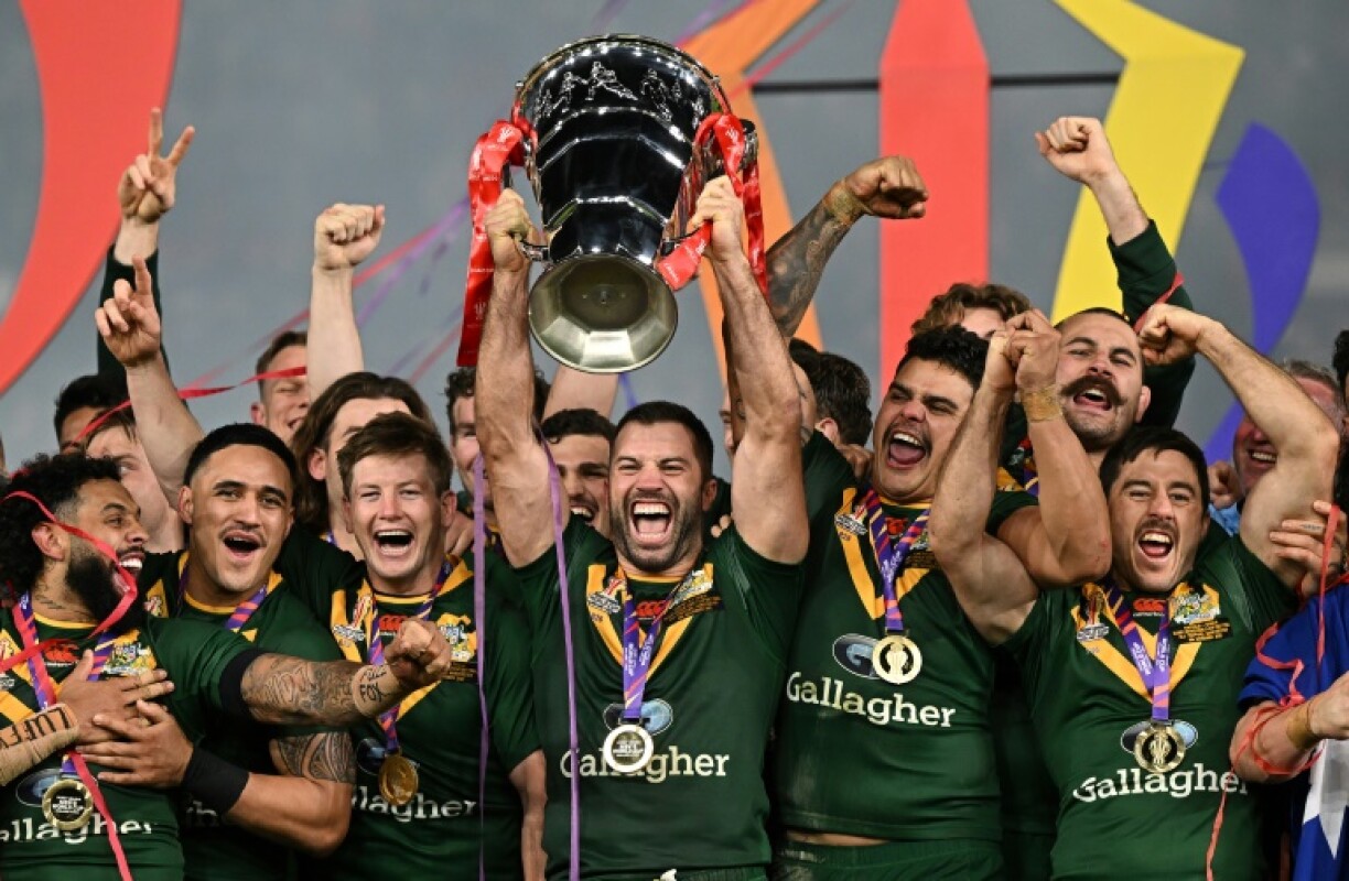 Australia's James Tedesco lifts the trophy after wining the Rugby League World Cup at Old Trafford in Manchester in 2022