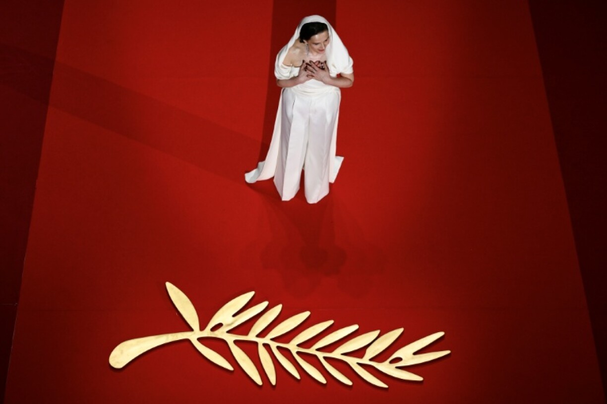 French actress Binoche arrives on stage during the opening ceremony