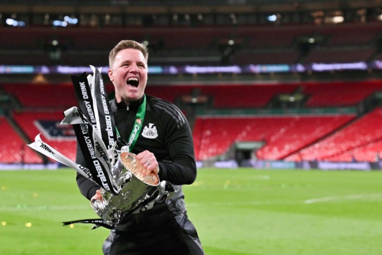 Newcastle boss Eddie Howe celebrates with the League Cup