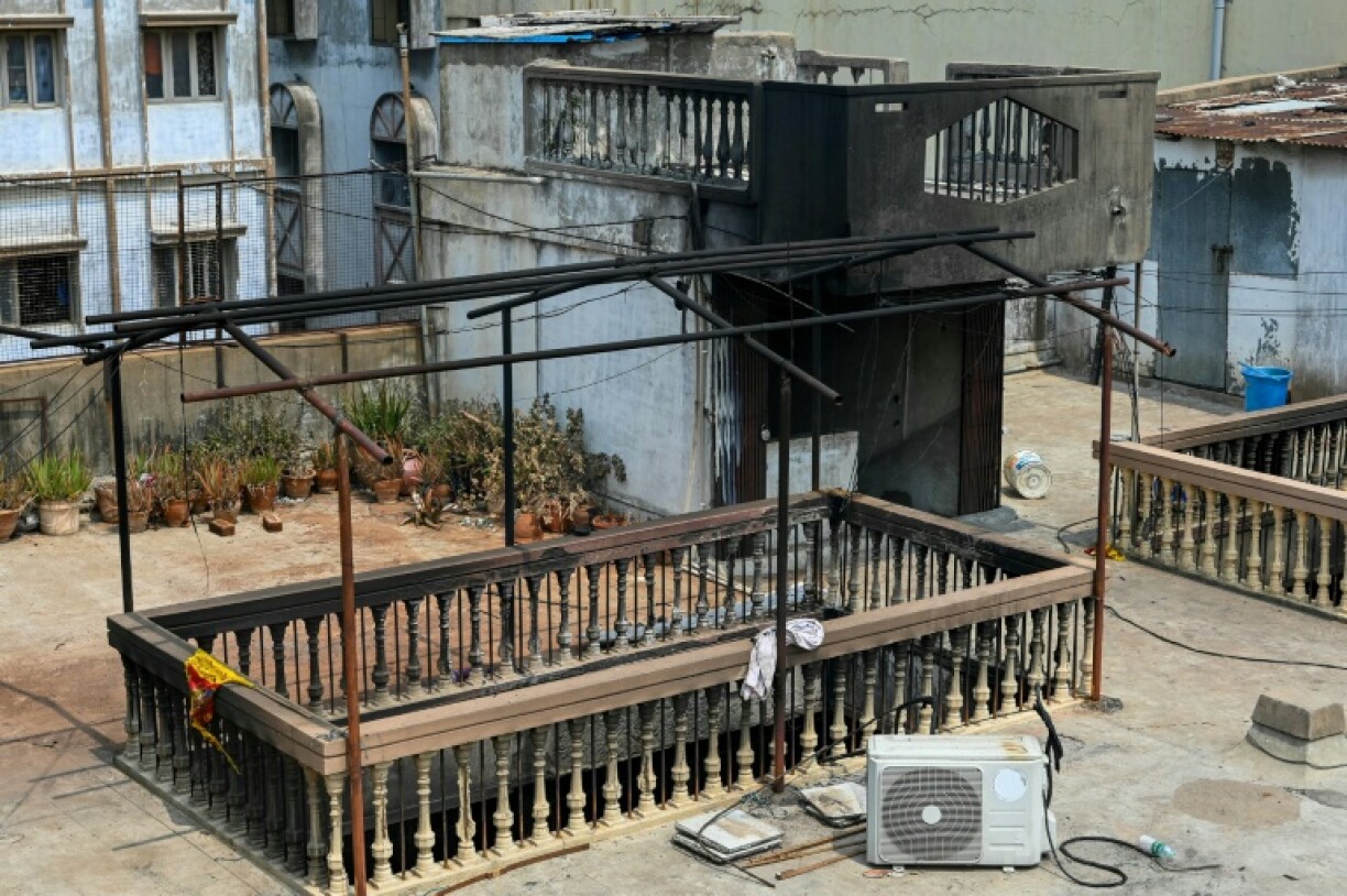 Scenes of damage from a fire at the Krishna Pearls building in Hyderabad, which killed at least 17 people