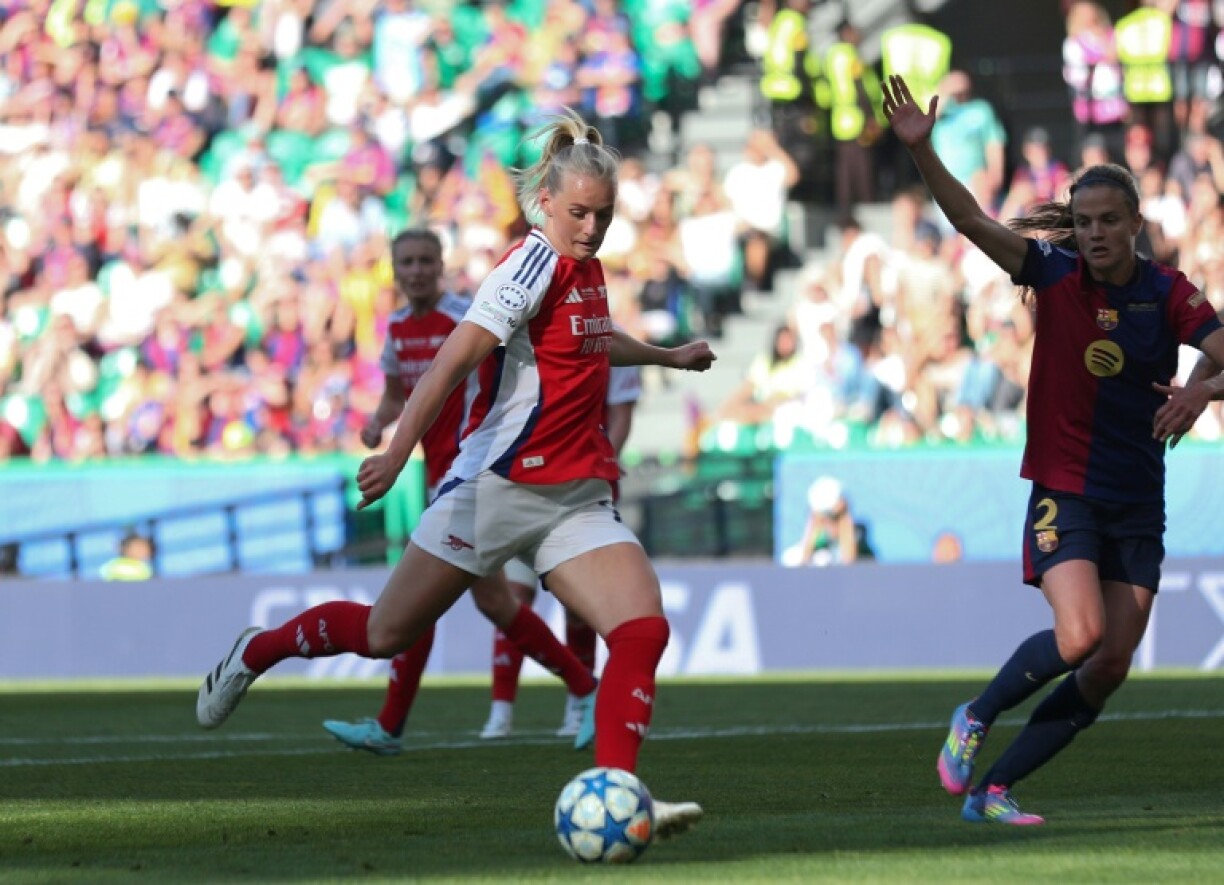 Arsenal's Swedish striker Stina Blackstenius scores the decisive goal in Lisbon