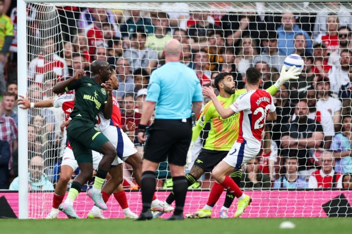 Yoane Wissa (left) scored Brentford's equaliser at Arsenal