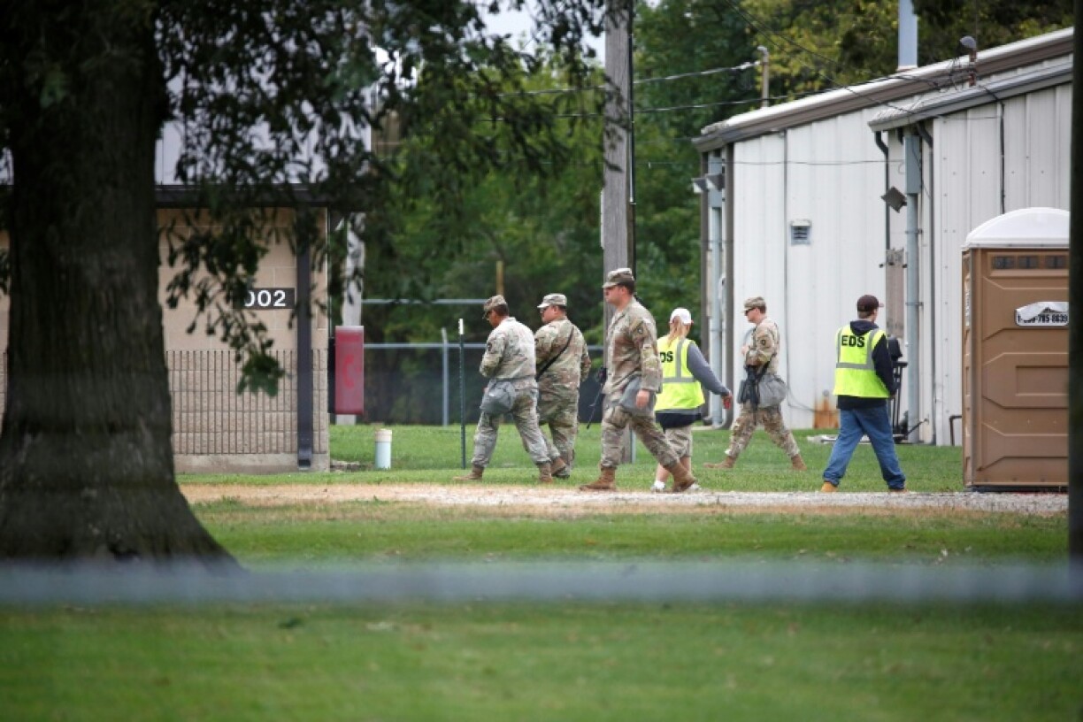 Texas Army National Guard troops are seen at a military facility in Elwood, Illinois on October 7, 2025