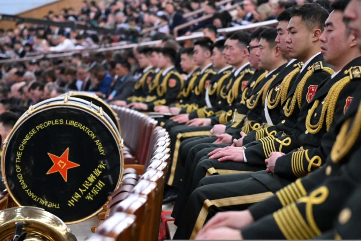 The People’s Liberation Army (PLA) band members in Beijing on Wednesday: China has the world's second-largest military budget, but lags well behind the United States, its primary strategic rival