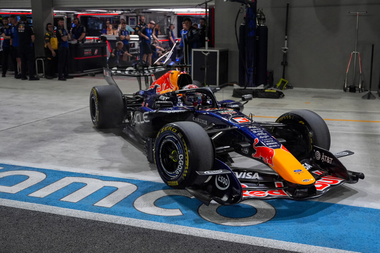 Red Bull Racing's Dutch driver Max Verstappen drives in the pits during the sprint qualifying session ahead of the Formula One Singapore Grand Prix at the Marina Bay Street Circuit in Singapore on October 9, 2026.