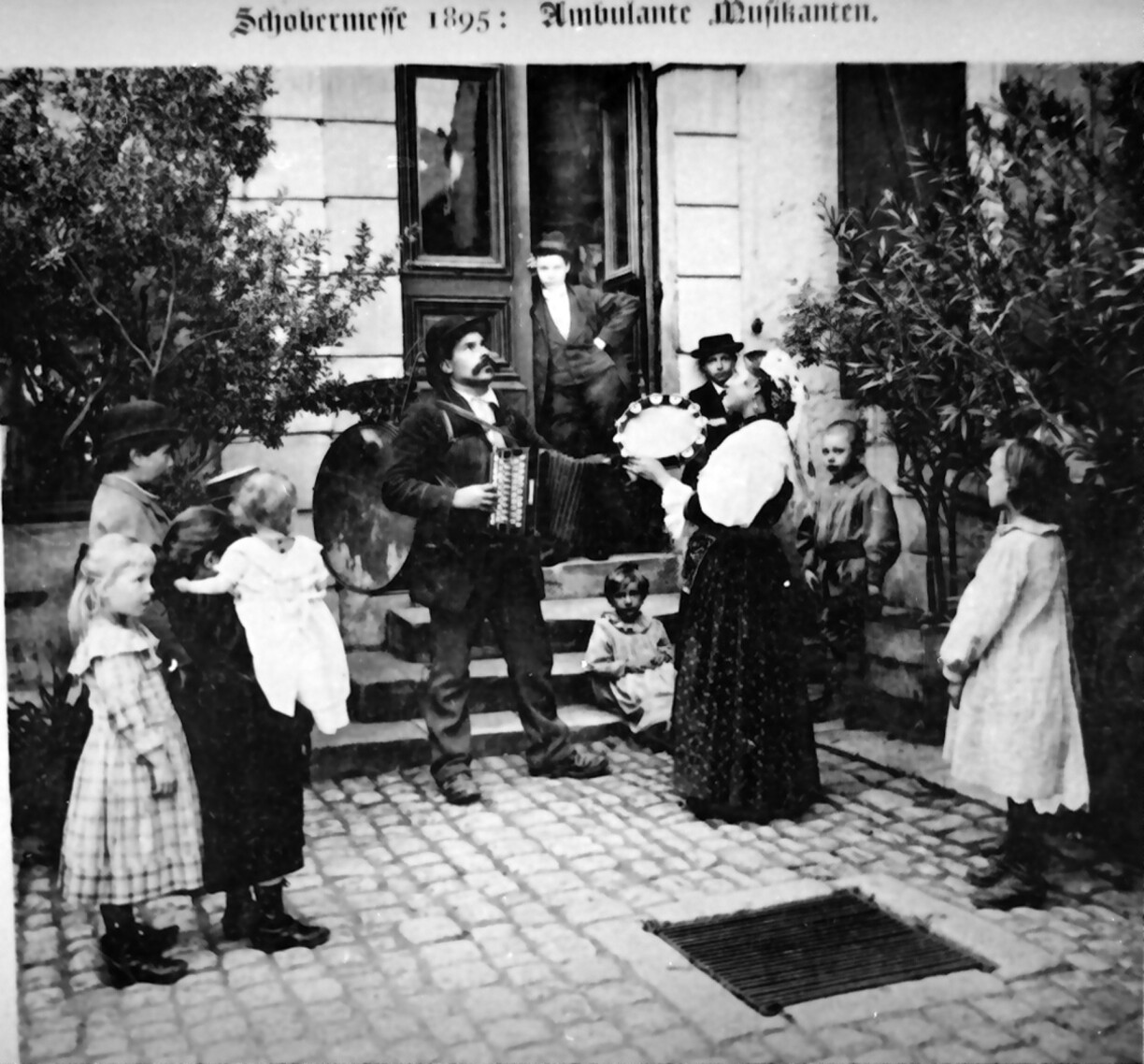 Busking musicians in 1895.