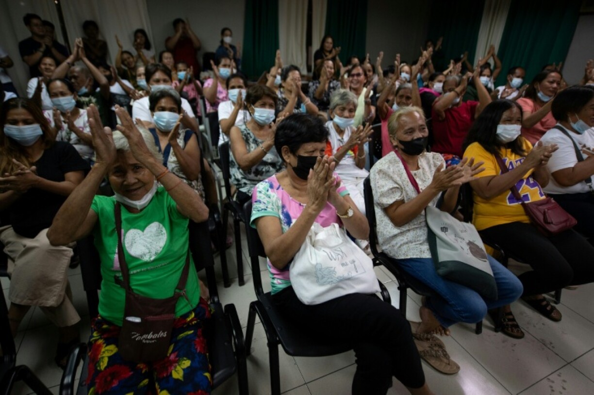Relatives of some of those who died in Duterte's campaign erupted in cheers and applause when the decision was announced