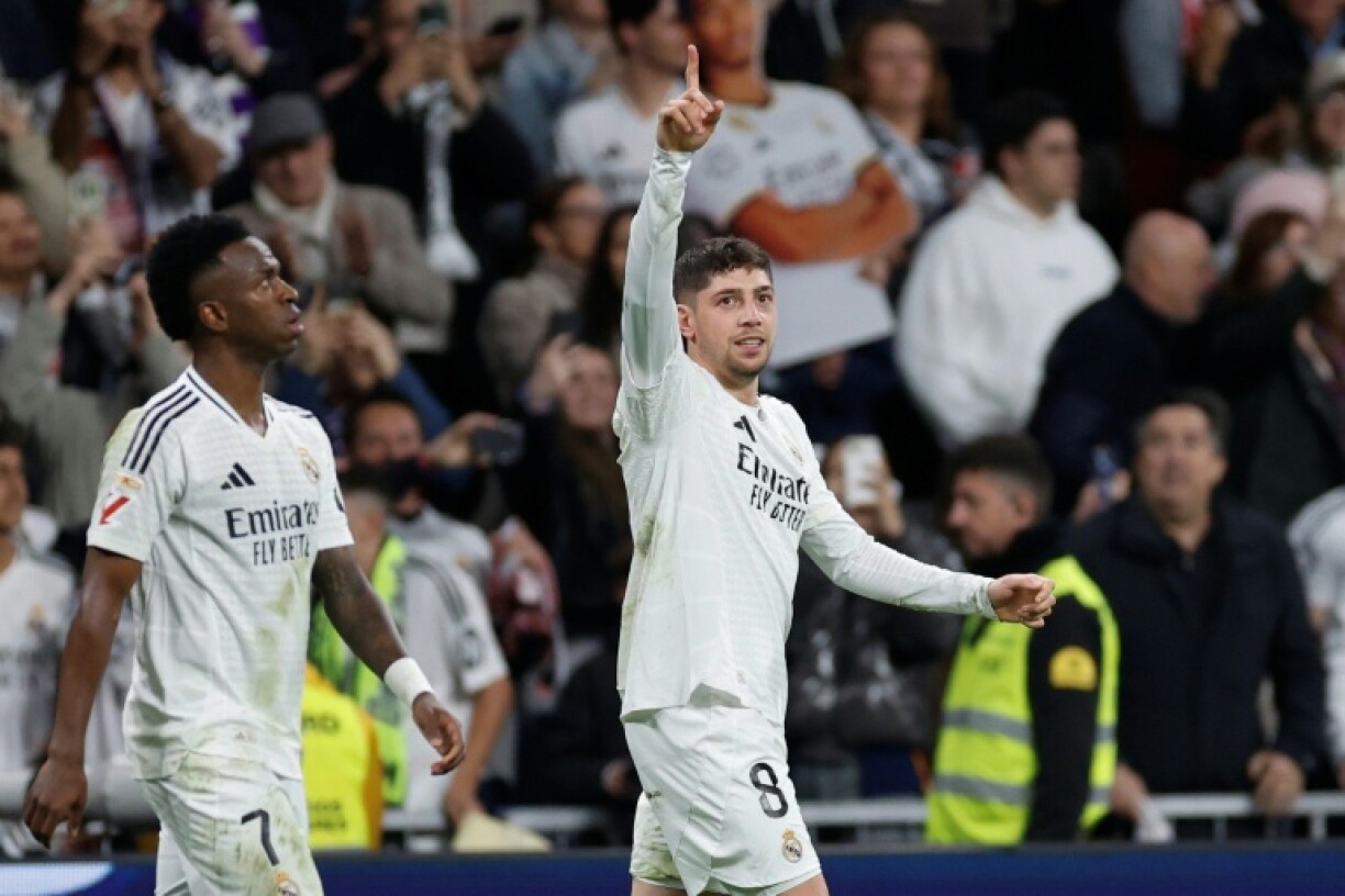 Real Madrid's Uruguayan midfielder Federico Valverde celebrates after scoring the winner