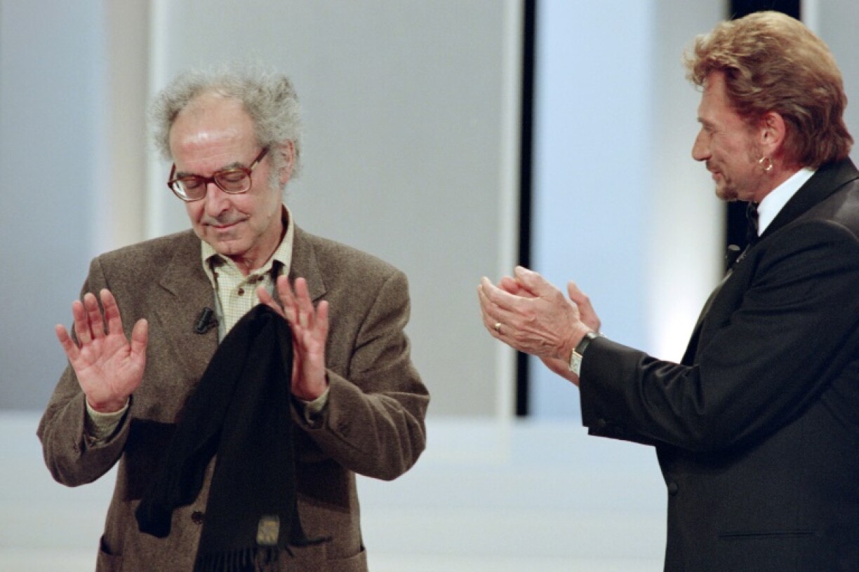 Jean-Luc Godard et Johnny Hallyday lors de la cérémonie des César à Paris le 28 février 1998
