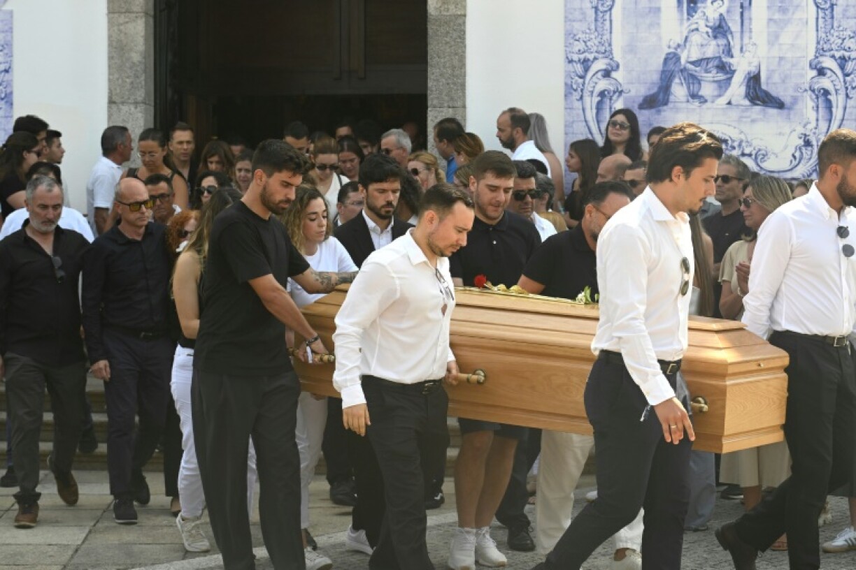 Diogo Jota's wife Rute Cardoso follows his coffin following the ceremony at the Mother Church of Gondomar, outside Porto