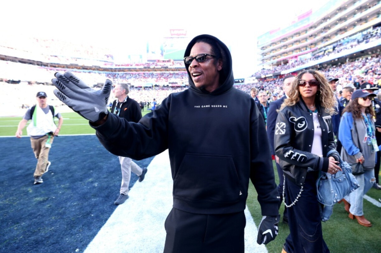Rapper Jay-Z, shown on the sideline at last season's Super Bowl, will serve as the halftime musical performer at next February's Super Bowl in Los Angeles, the NFL announced