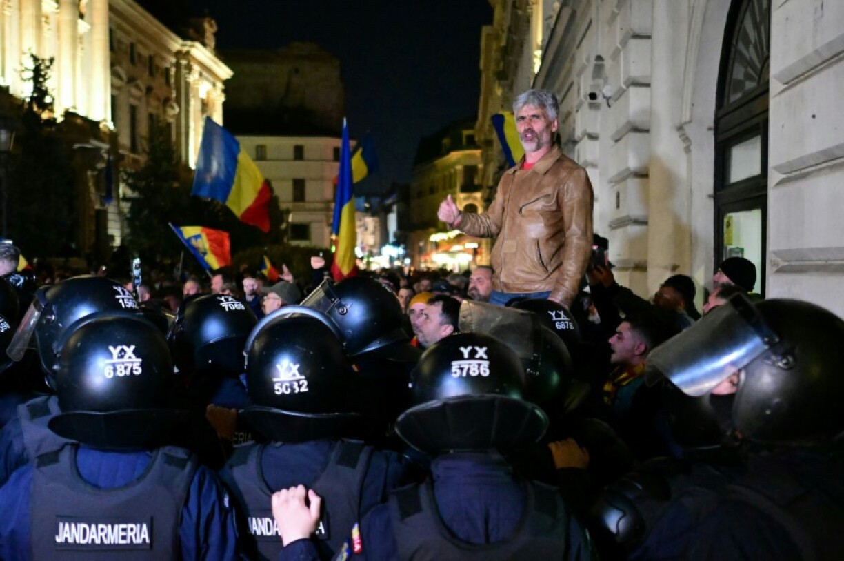 Romanian authorities were trying to disperse violent protesters with tear gas, as objects were being thrown