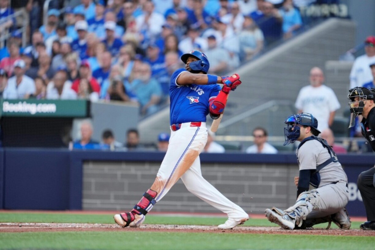 Toronto's Vladimir Guerrero Jr. hits a grand slam in the Blue Jays' victory over the New York Yankees in game two of their MLB playoff series