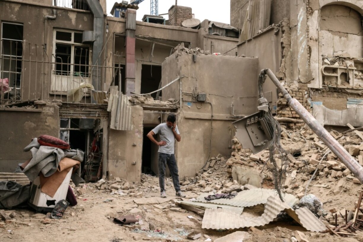 Destructions à Téhéran après une frappe aérienne, le 15 mars 2026