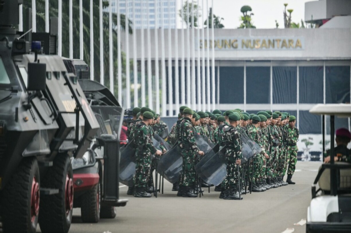 Indonesian army soldiers gather at the parliament complex in Jakarta