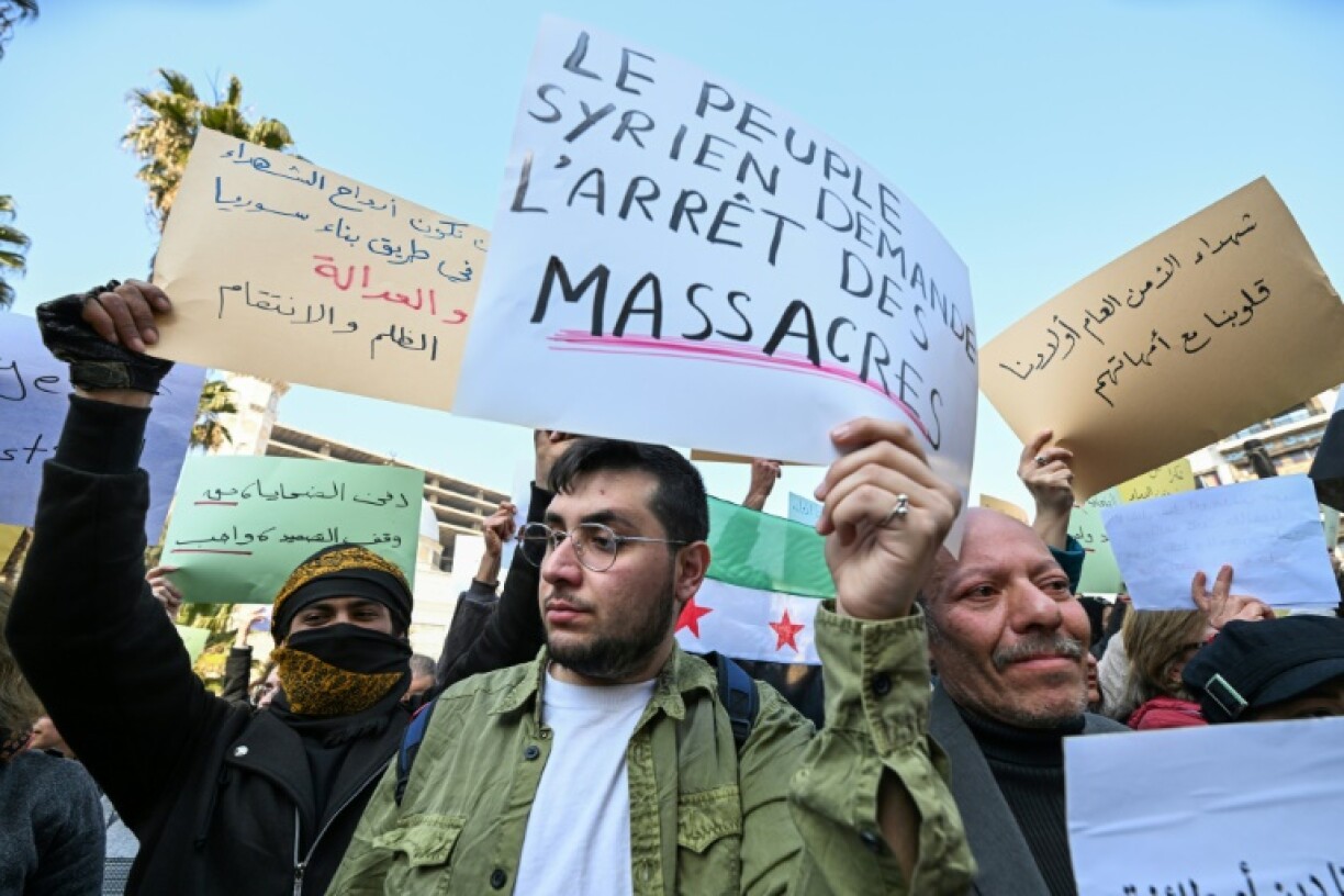 Demonstrators who gathered in Damascus to mourn civilian and security casualties were met with counter-protesters