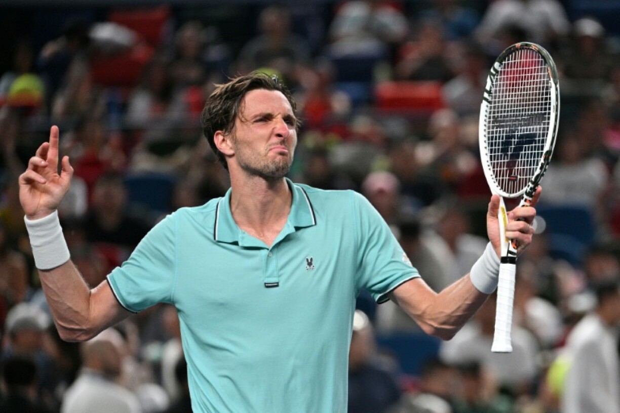 France's Arthur Rinderknech celebrates beating Germany's Alexander Zverev in their singles match at the Shanghai Masters