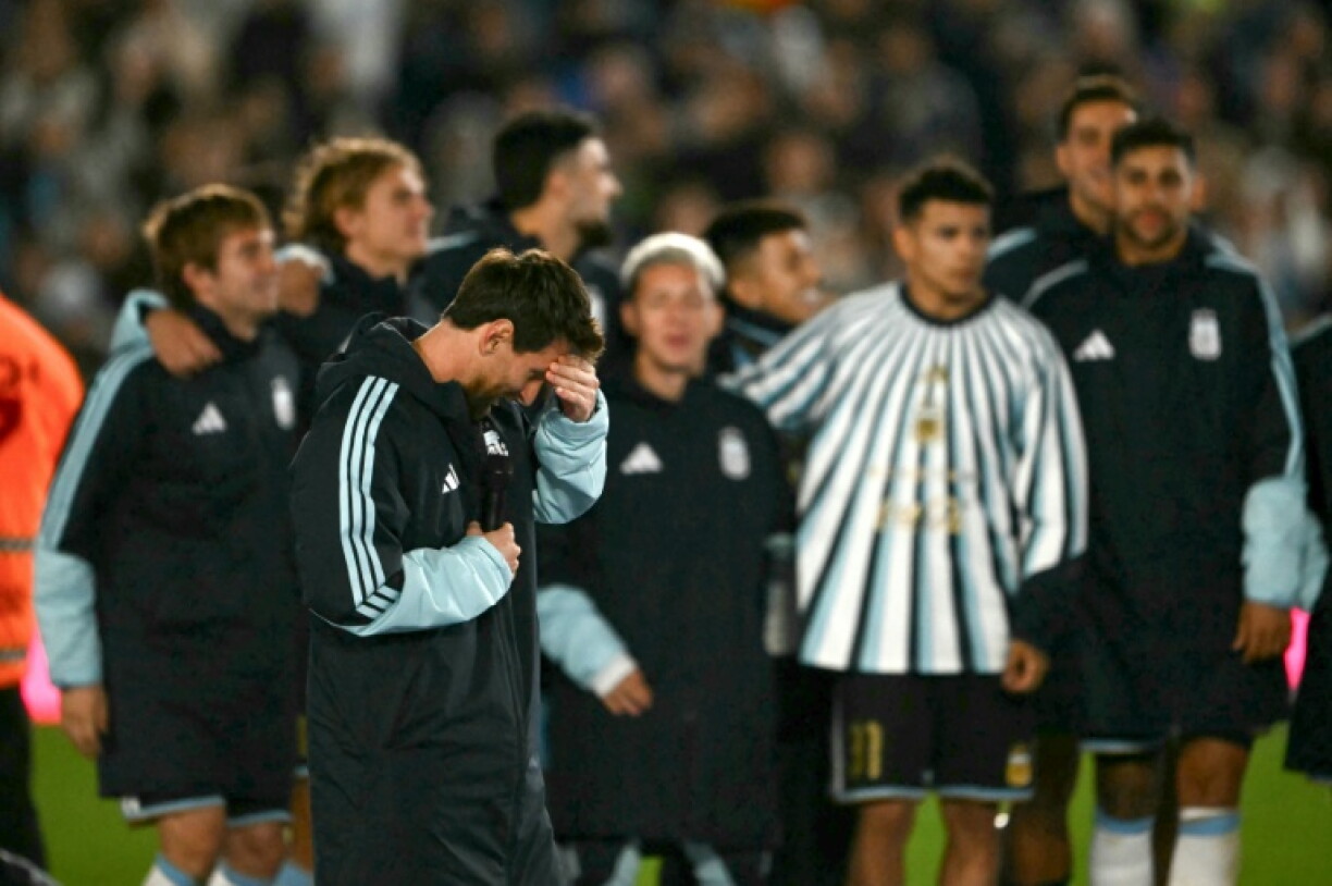 Argentina's forward Lionel Messi gestures as he speaks following his final game of international football
