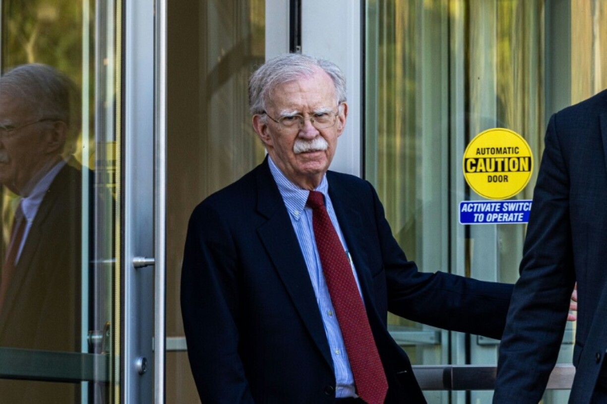 Former US national security advisor John Bolton leaves federal court in Greenbelt, Maryland, after pleading not guilty to charges of mishandling classified information