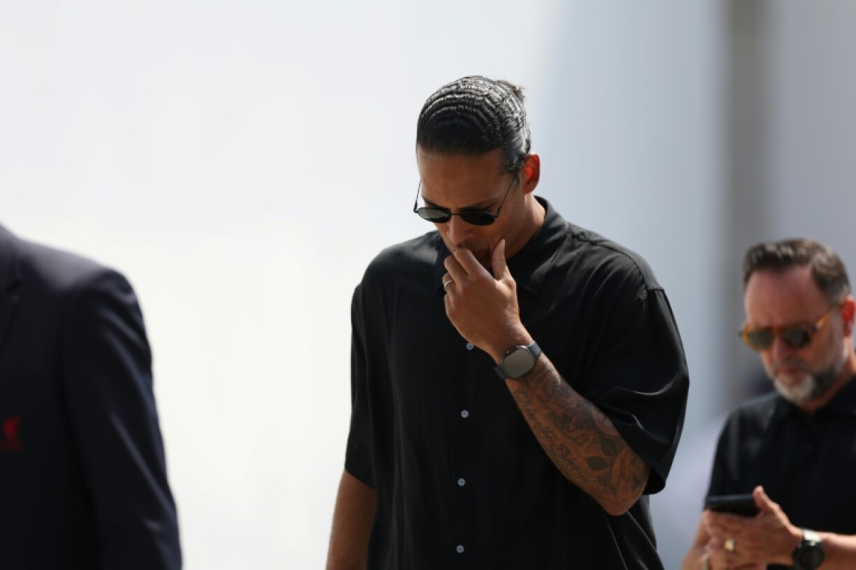 Liverpool skipper Virgil van Dijk reacts after the funeral attended by a clutch of teammates from the club and the Portugal squad