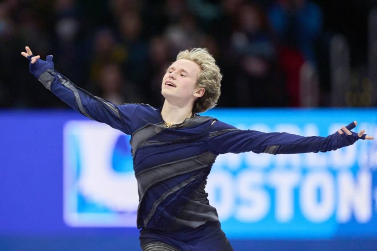 Defending champion Ilia Malinin on his way to victory in the short program