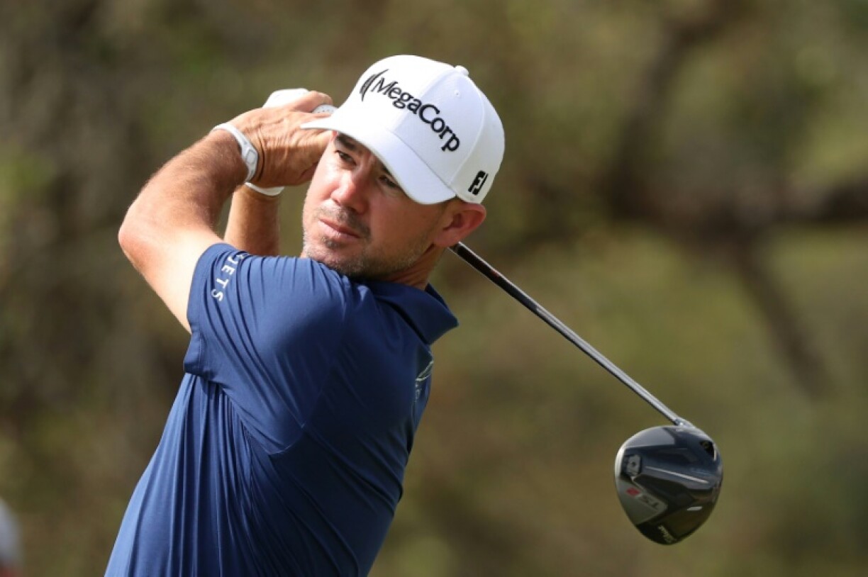 American Brian Harman plays a tee shot on the way to the 36-hole lead at the US PGA Tour Texas Open