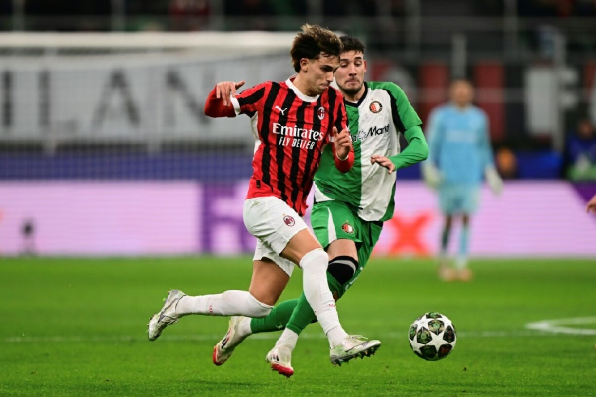 Joao Felix (L) spent part of last season on loan at AC Milan from Chelsea