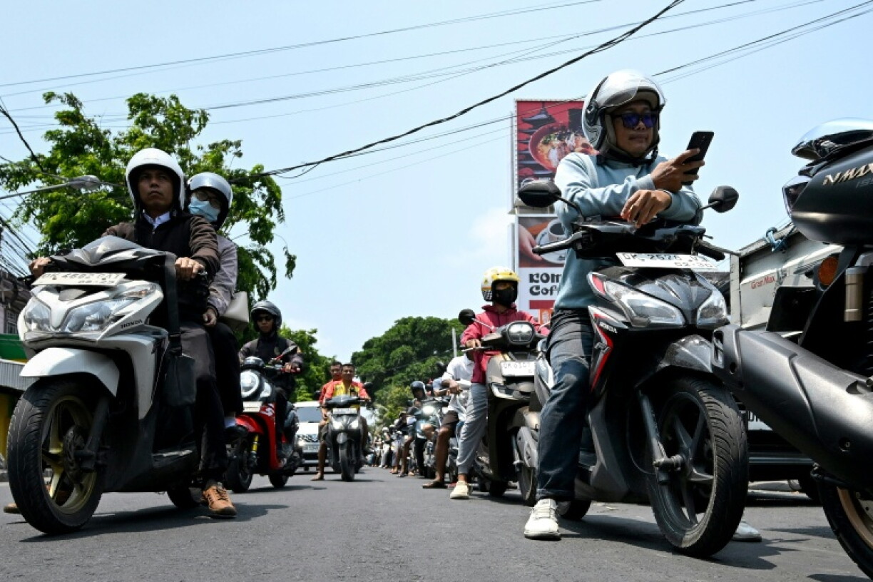 Long lines stretch from petrol stations on tourist hub Bali as fuel shortages bite