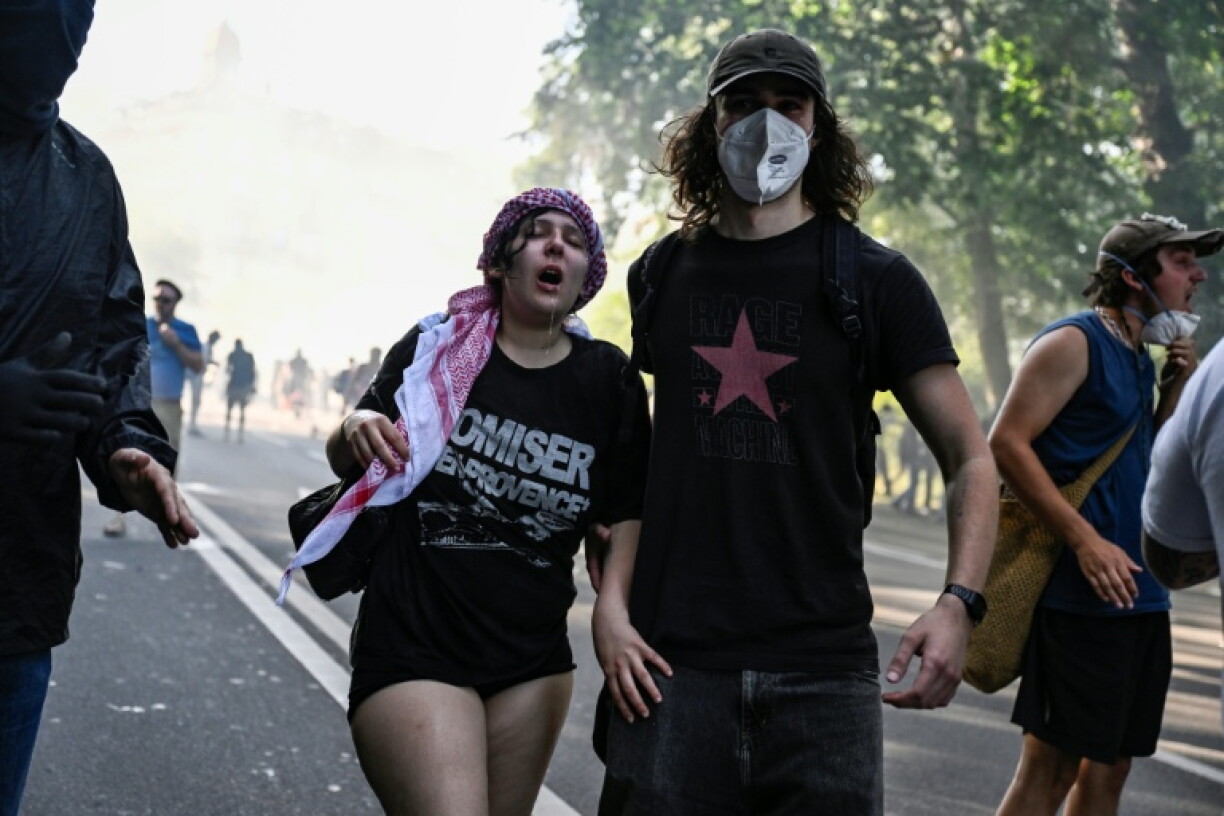 Manifestants lors d'une marche anti-G7 à Génève, le 14 juin 2026