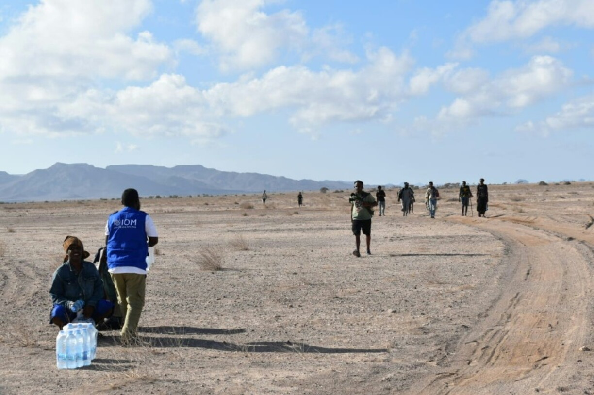 The International Organization for Migration released a photograph of staff helping survivors